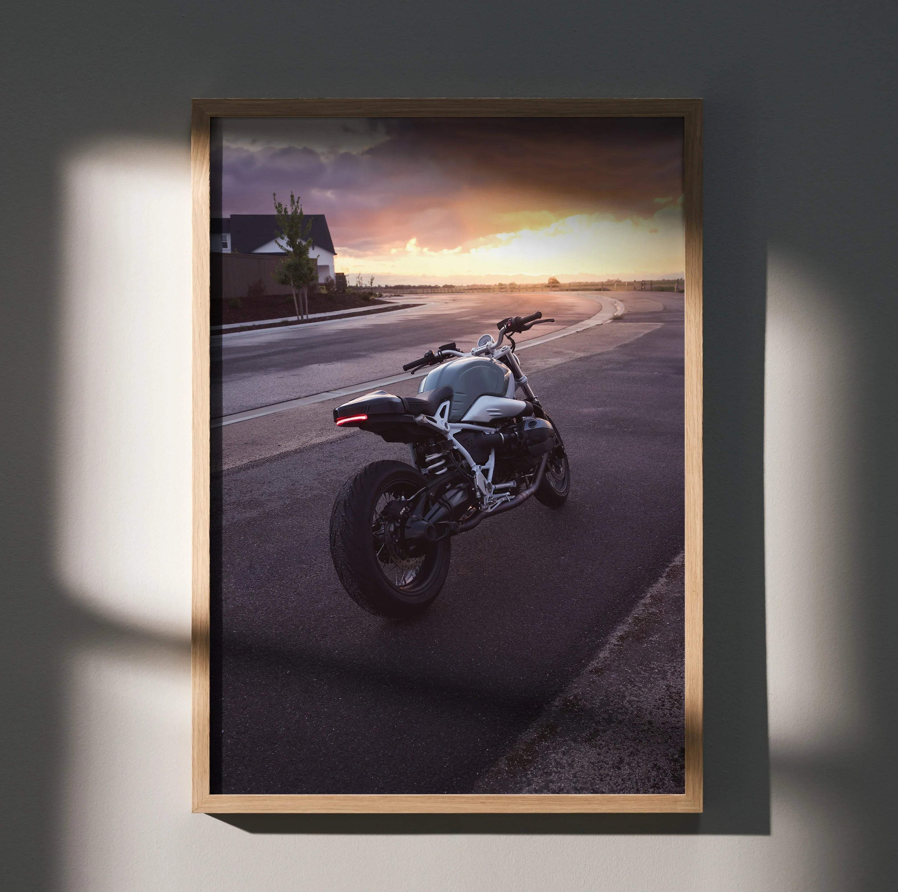 BMW R Nine T motorcycle parked on roadside at sunset poster wall art in wooden frame.