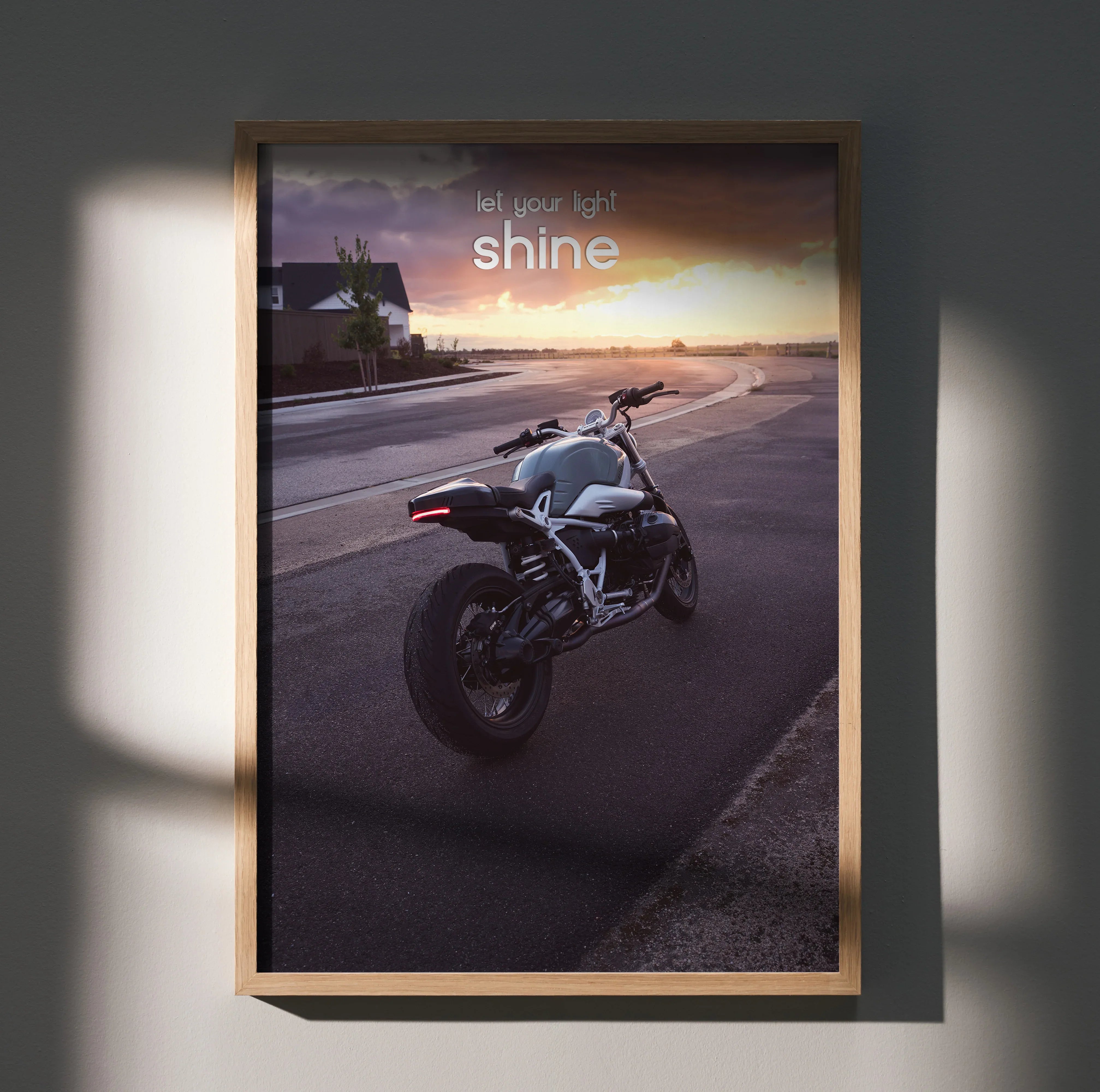 BMW R Nine T motorcycle on road at sunset with motivational text shine poster wall art.