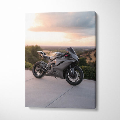 Yamaha R6 black sport motorcycle on canvas wall art with scenic sunset background.