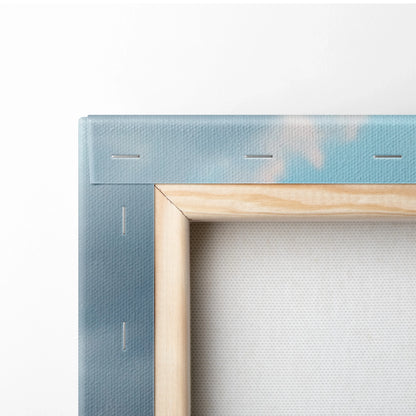 Corner view of Yamaha R6 motorcycle canvas art with wooden stretcher frame showing canvas texture and blue sky design.