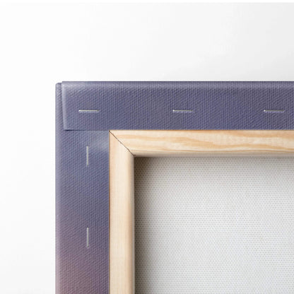 Close-up of wooden frame corner and stretched canvas fabric showcasing canvas wall art quality.