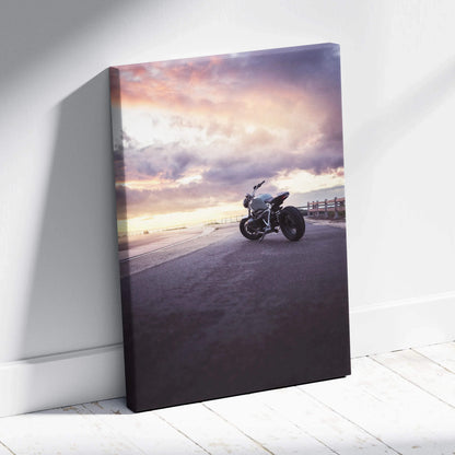 BMW R Nine T motorcycle at sunset on canvas wall art with dramatic sky background.