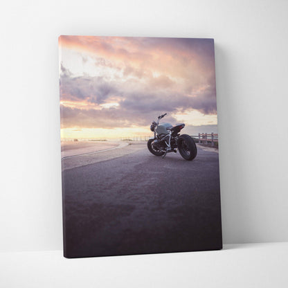BMW R Nine T motorcycle at sunset on asphalt road canvas art wall decor.