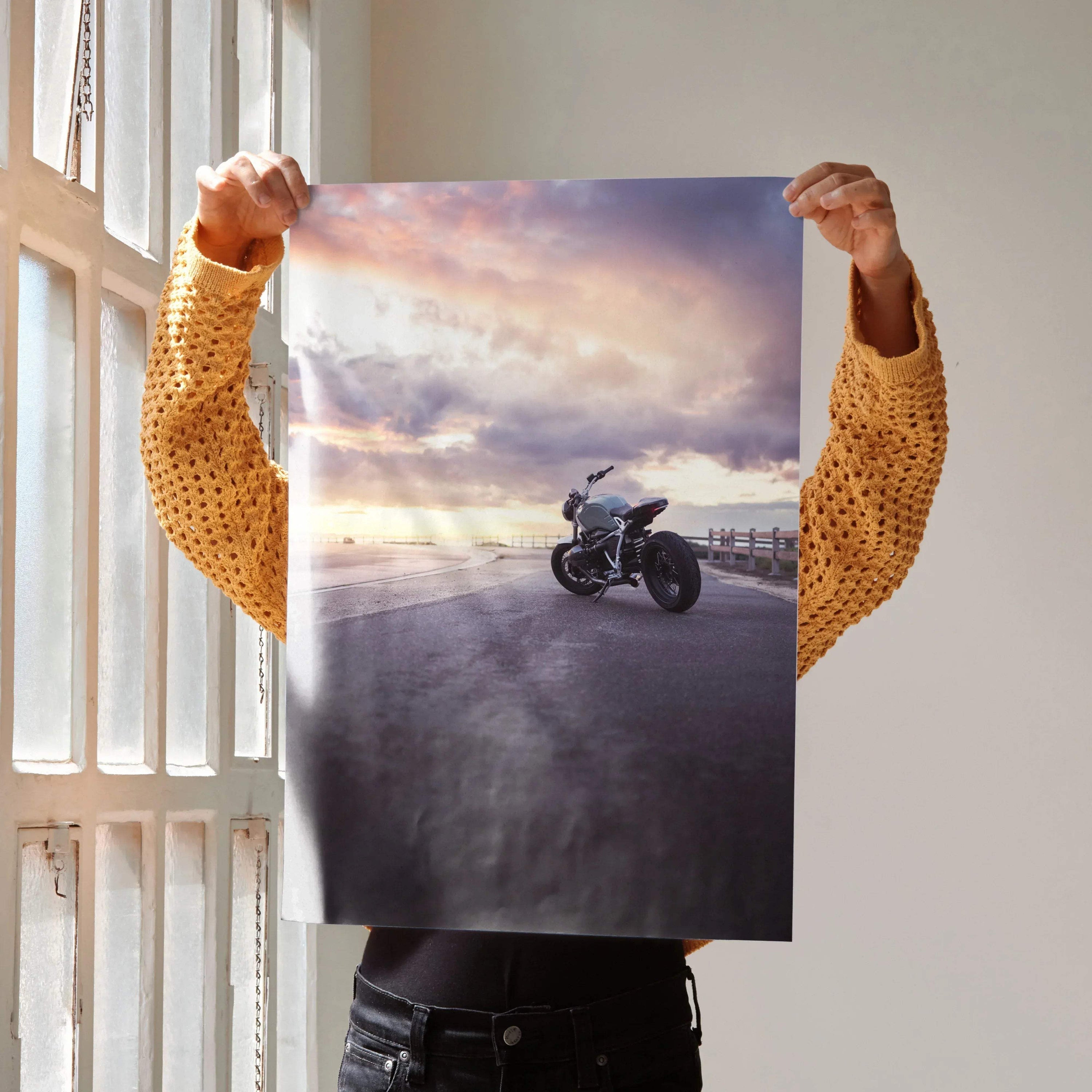 BMW R Nine T motorcycle poster with dramatic sunset sky, sleek black bike wall art.