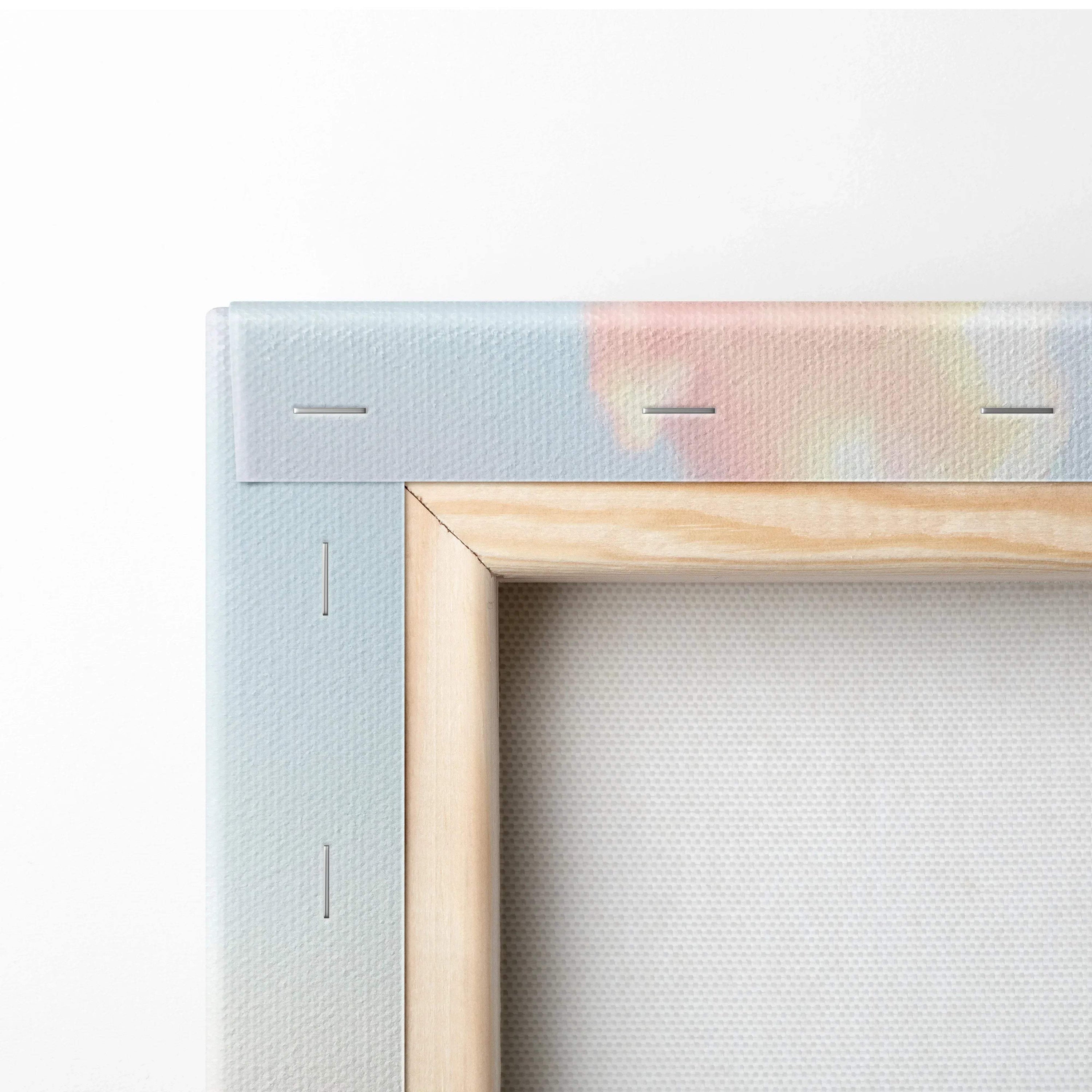 Close-up of wooden frame corner on BMW S1000RR vertical canvas wall art with staple-secured light blue and pastel edge.
