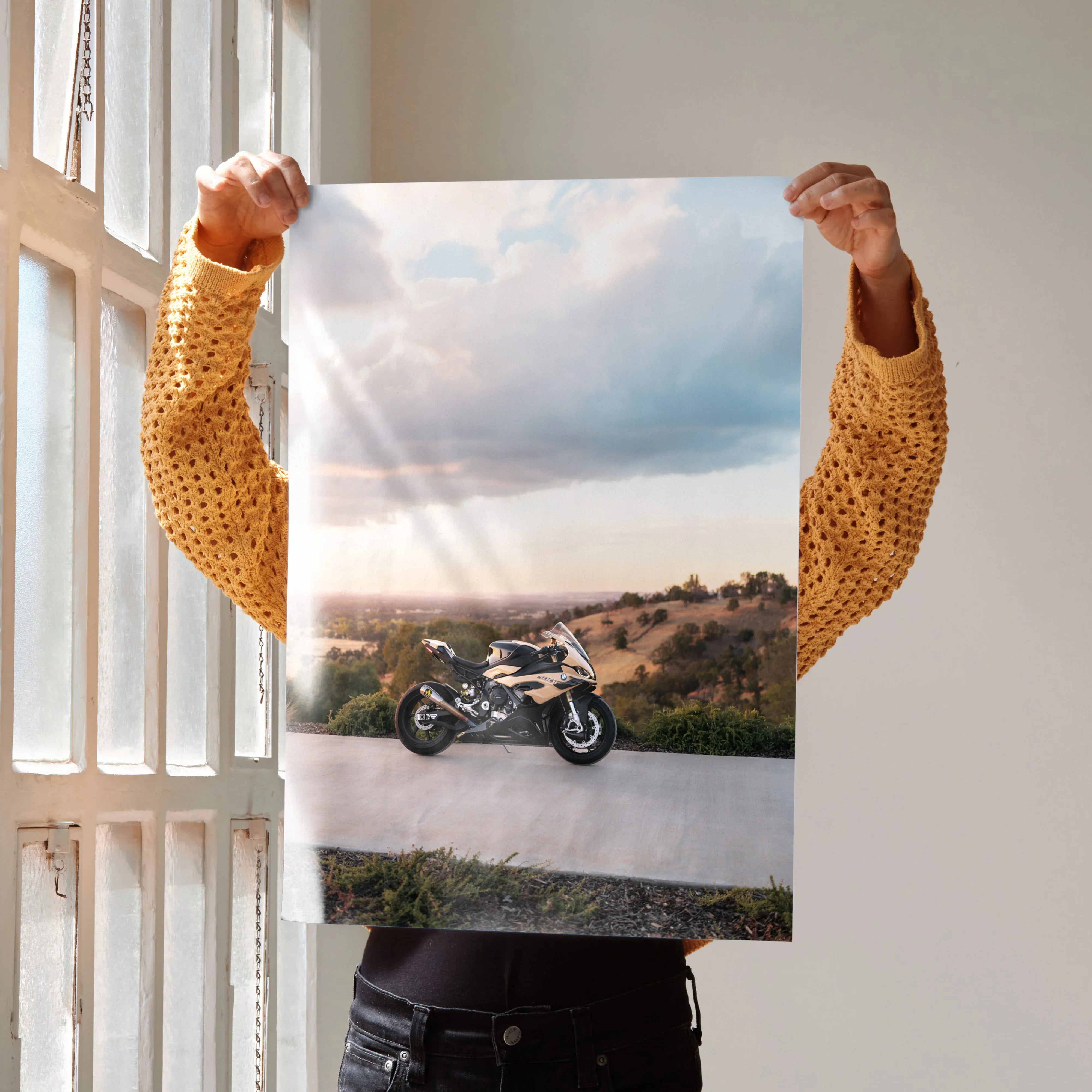 BMW S1000RR motorcycle poster displaying bike on scenic road under cloudy sky, stylish wall art.