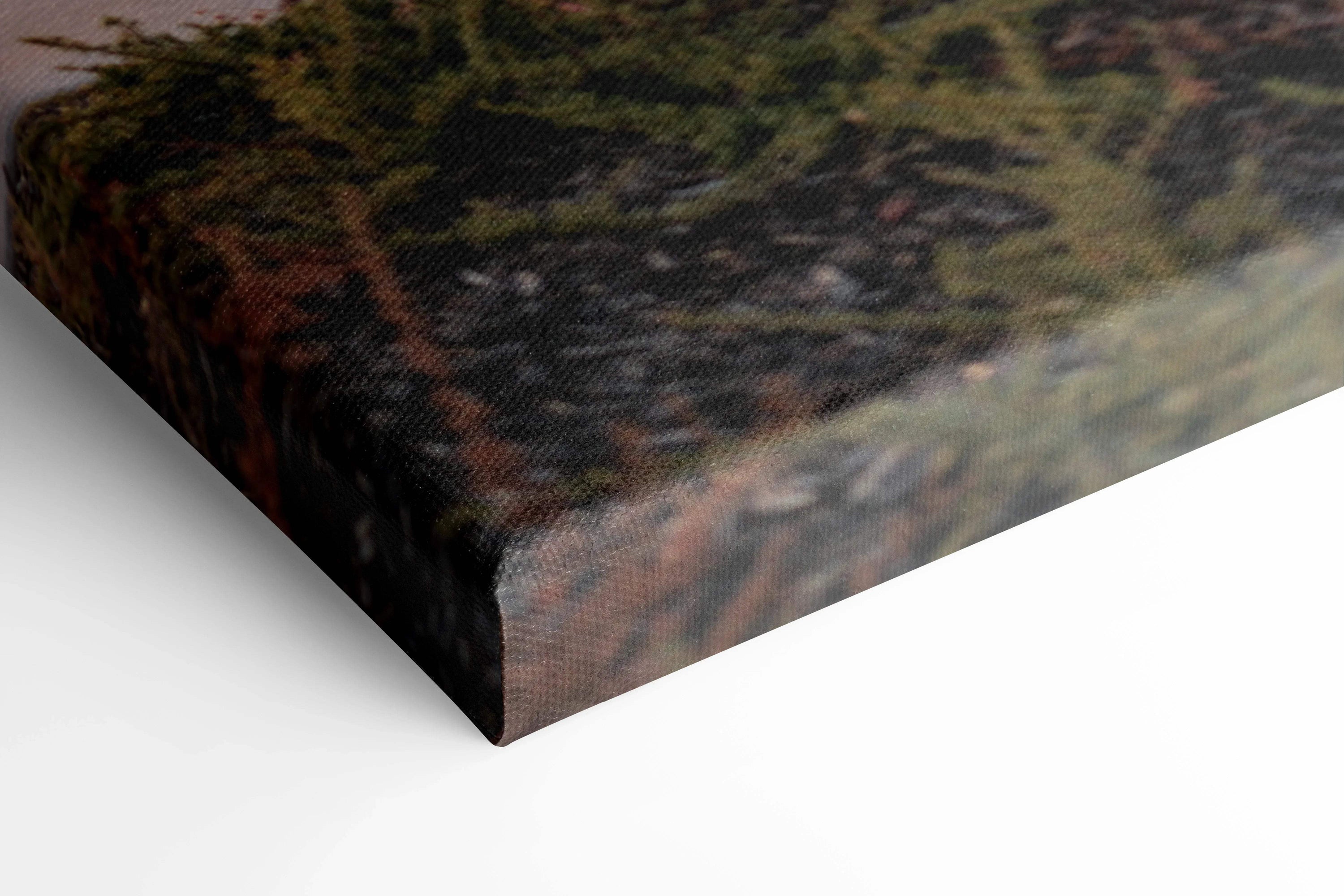 Close-up of textured canvas art corner showing museum-quality print on thick gallery-wrapped canvas wall art.