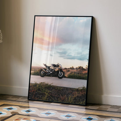BMW S1000RR motorcycle poster with sunset sky, modern wall art in black frame.