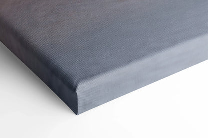 Close-up of dark gray stretched canvas corner, showcasing thick gallery-style wrap for wall art canvas print.