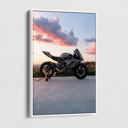 Vertical canvas wall art featuring a black Yamaha R6 motorcycle against a sunset sky.