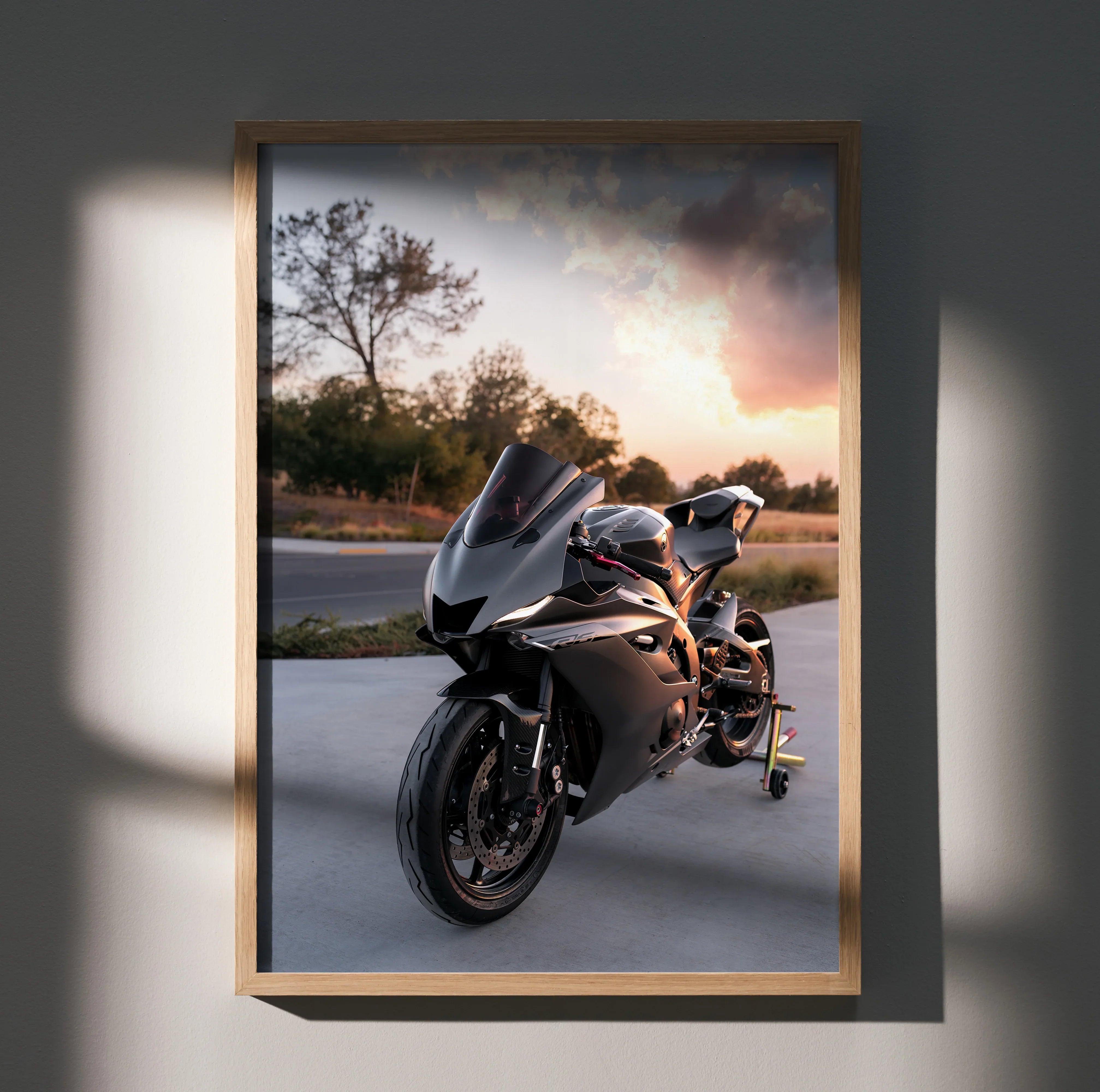 Yamaha R6 motorcycle parked at sunset poster wall art in wooden frame.