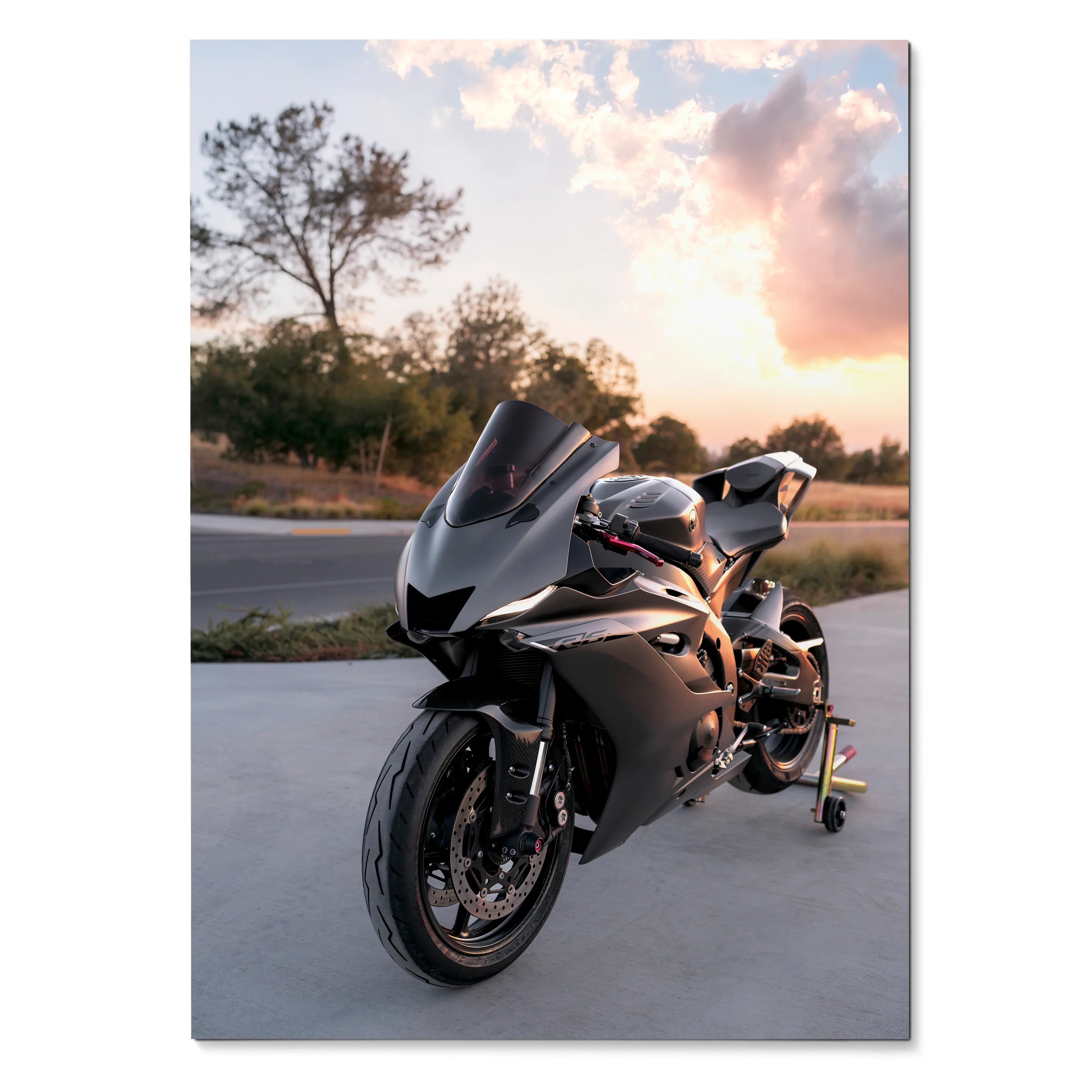 Yamaha R6 motorcycle poster with sleek black bike and sunset sky, wall art for motorsport fans.