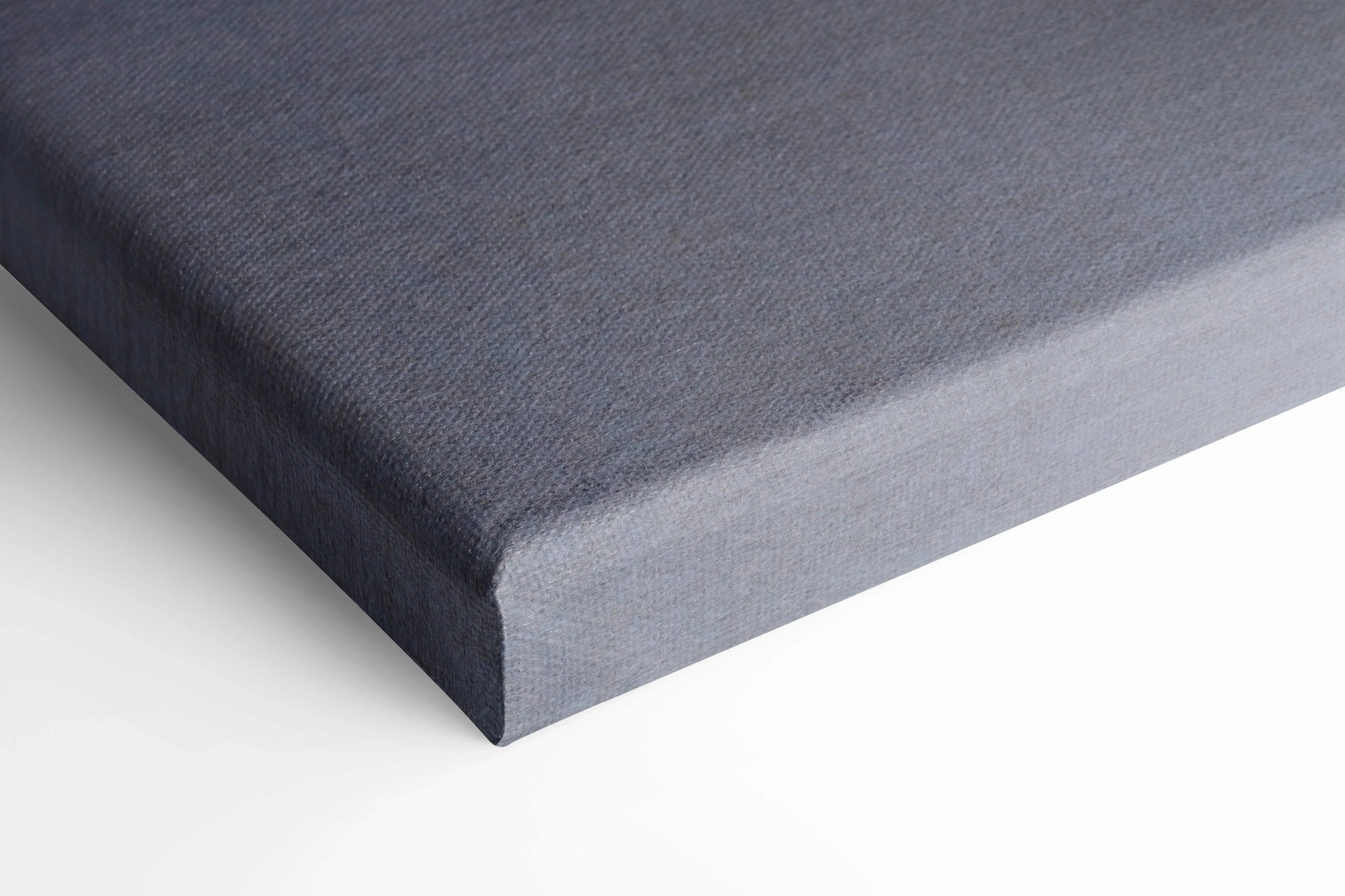 Close-up of gray wrapped canvas corner for high-resolution wall art print.