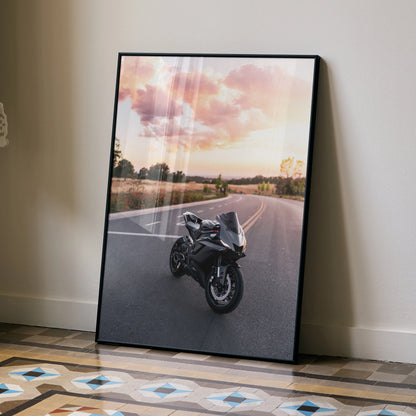 Yamaha R6 motorcycle parked on open road at sunset poster wall art in black frame.