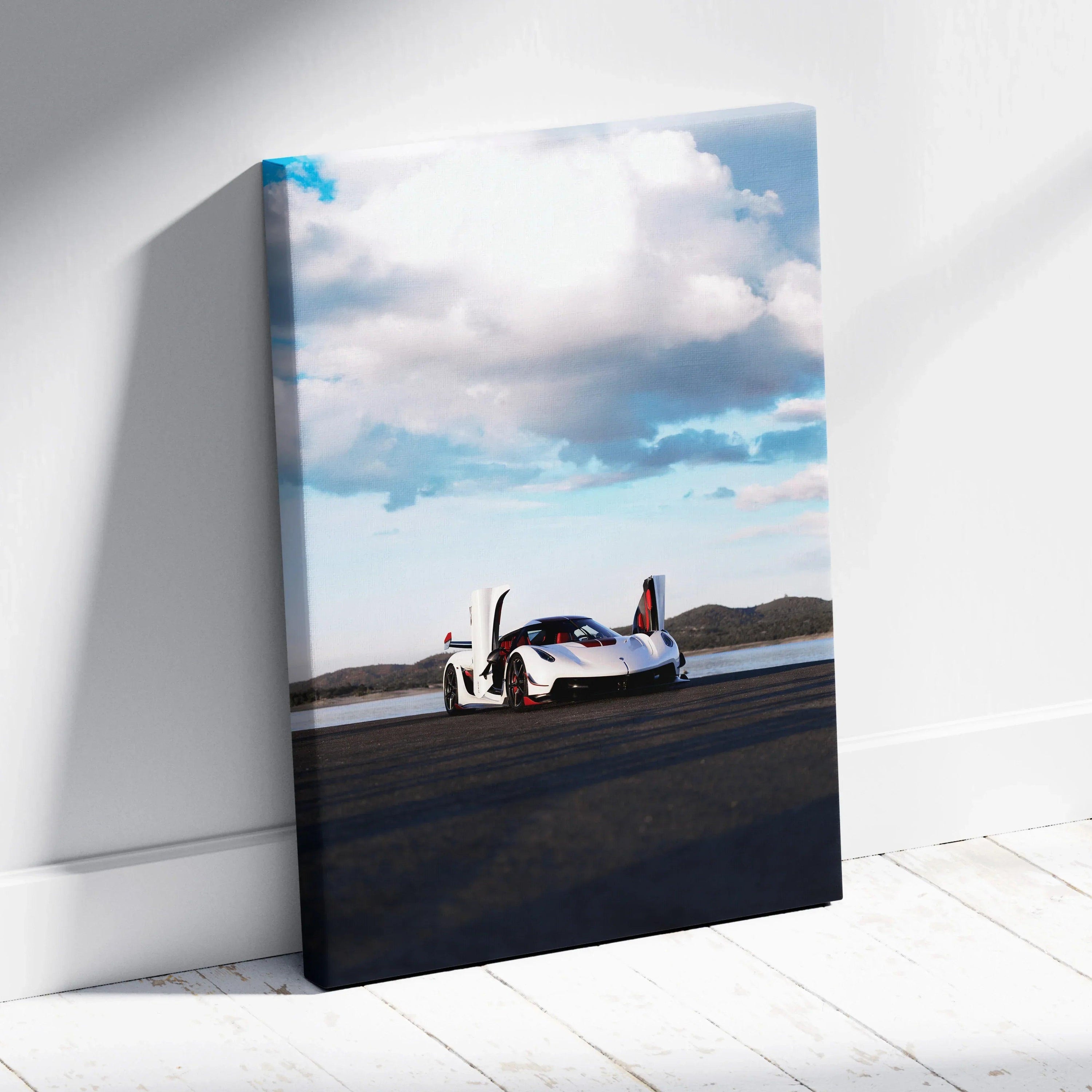 Koenigsegg Jesko sports car on road against blue sky canvas wall art print vertical.