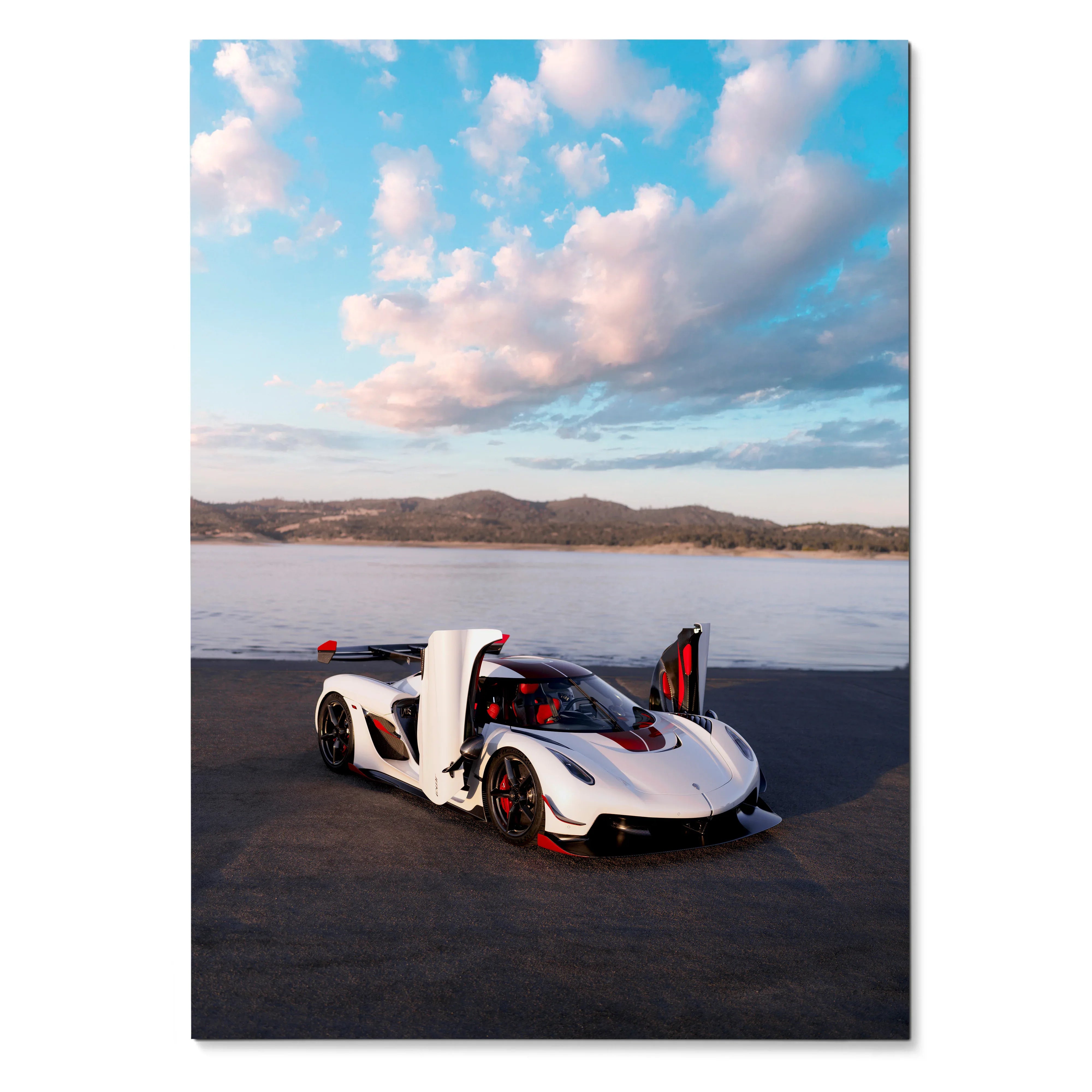 Koenigsegg Jesko sports car with open butterfly doors on asphalt under pink and blue cloudy sky poster wall art.