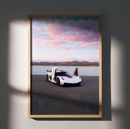 Koenigsegg Jesko car poster with white sports car on empty road under pink and blue sky wall art.