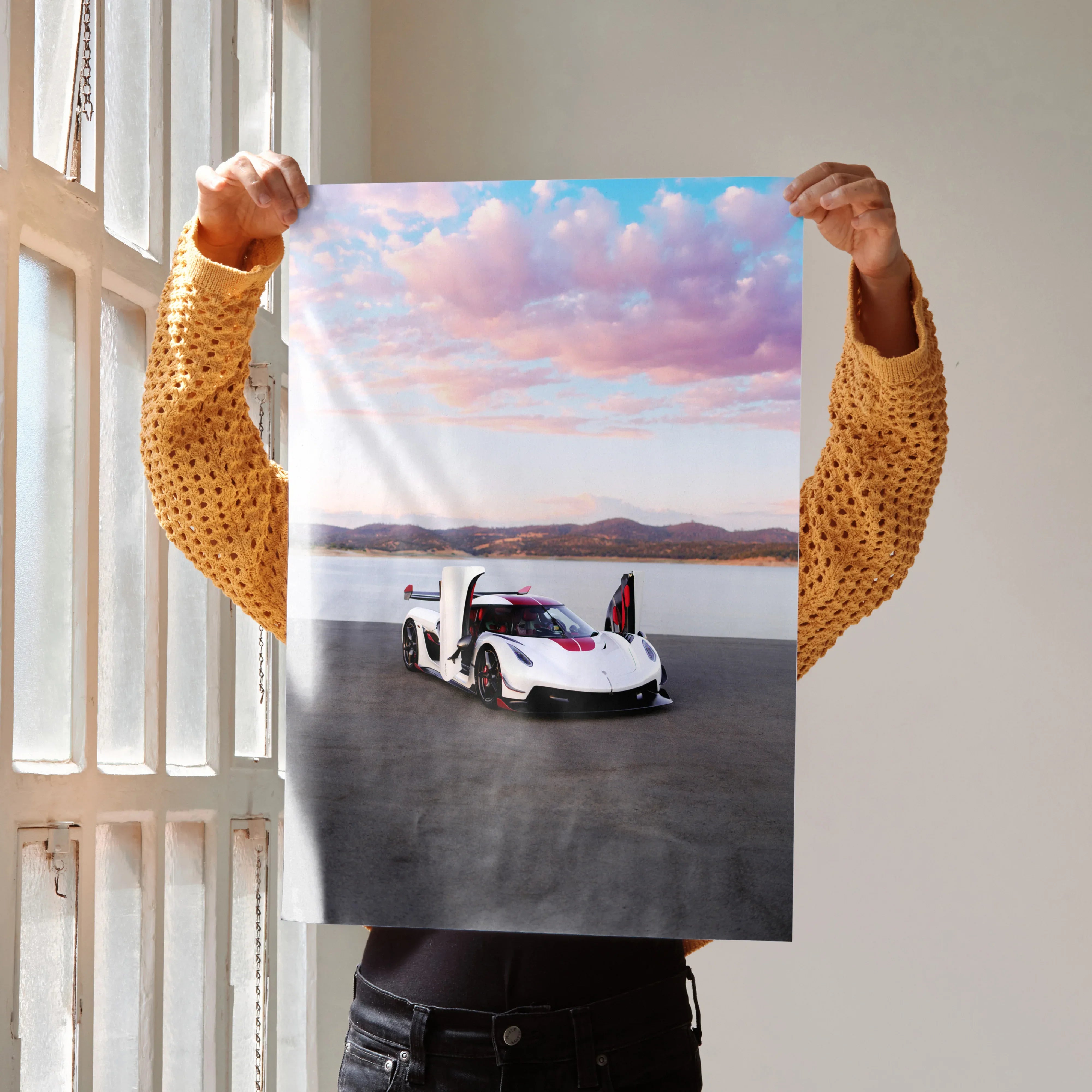 Koenigsegg Jesko white sports car against colorful sunset sky poster wall art.