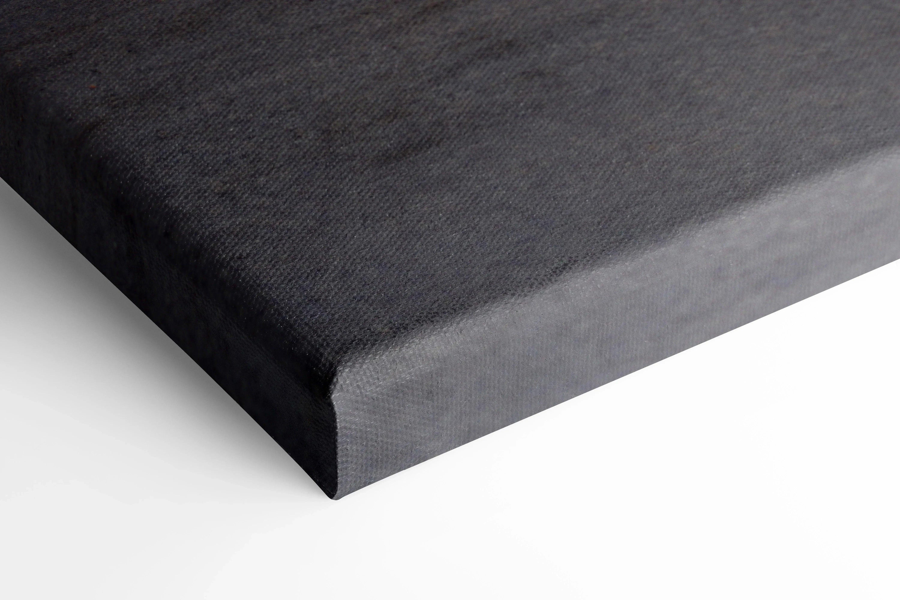 Black textured canvas corner close-up showcasing premium wall art quality and detail.