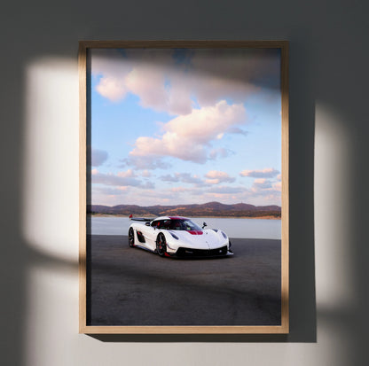 Koenigsegg Jesko sports car poster with scenic sky, framed wall art in natural light.