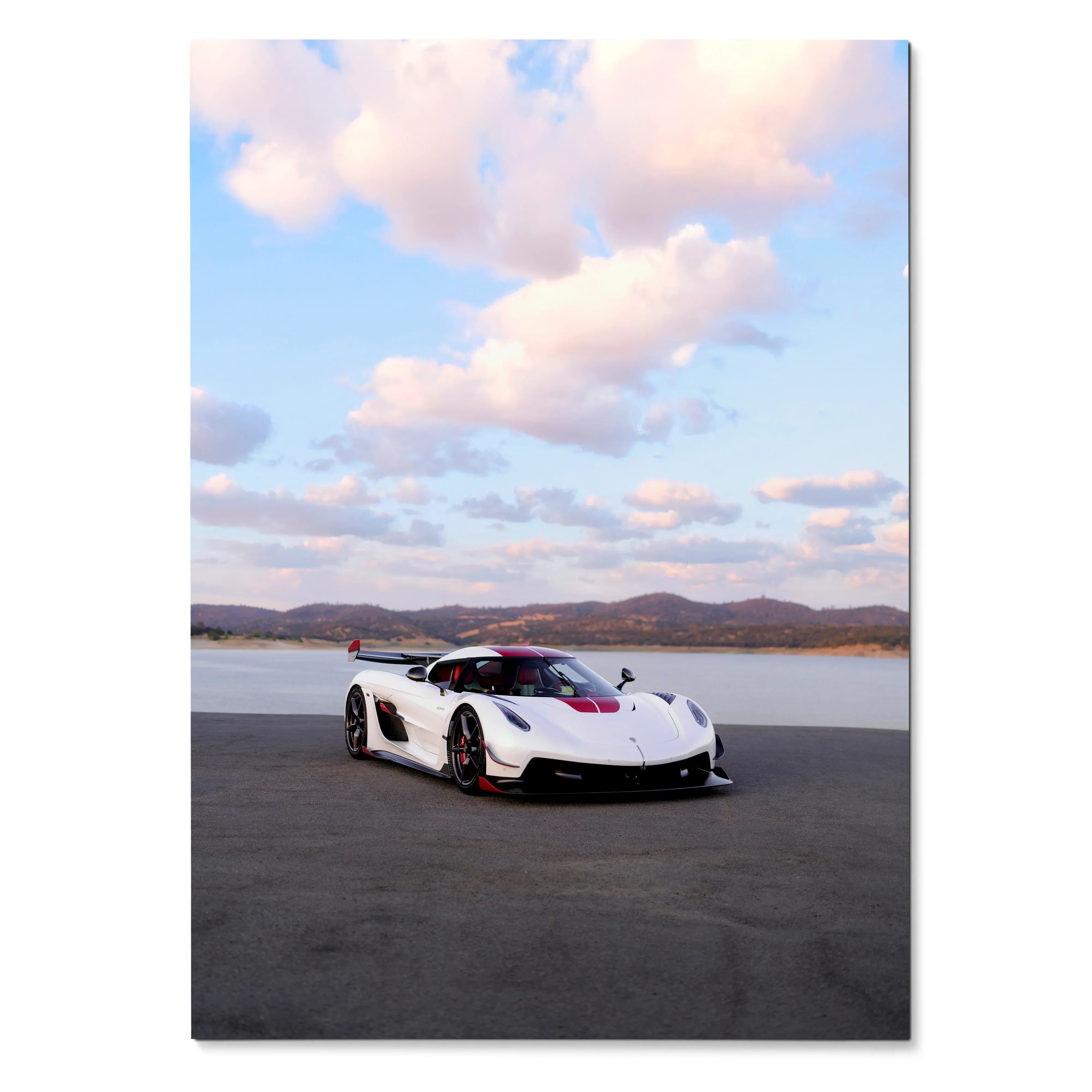 Koenigsegg Jesko supercar in white parked on asphalt under blue sky poster wall art.