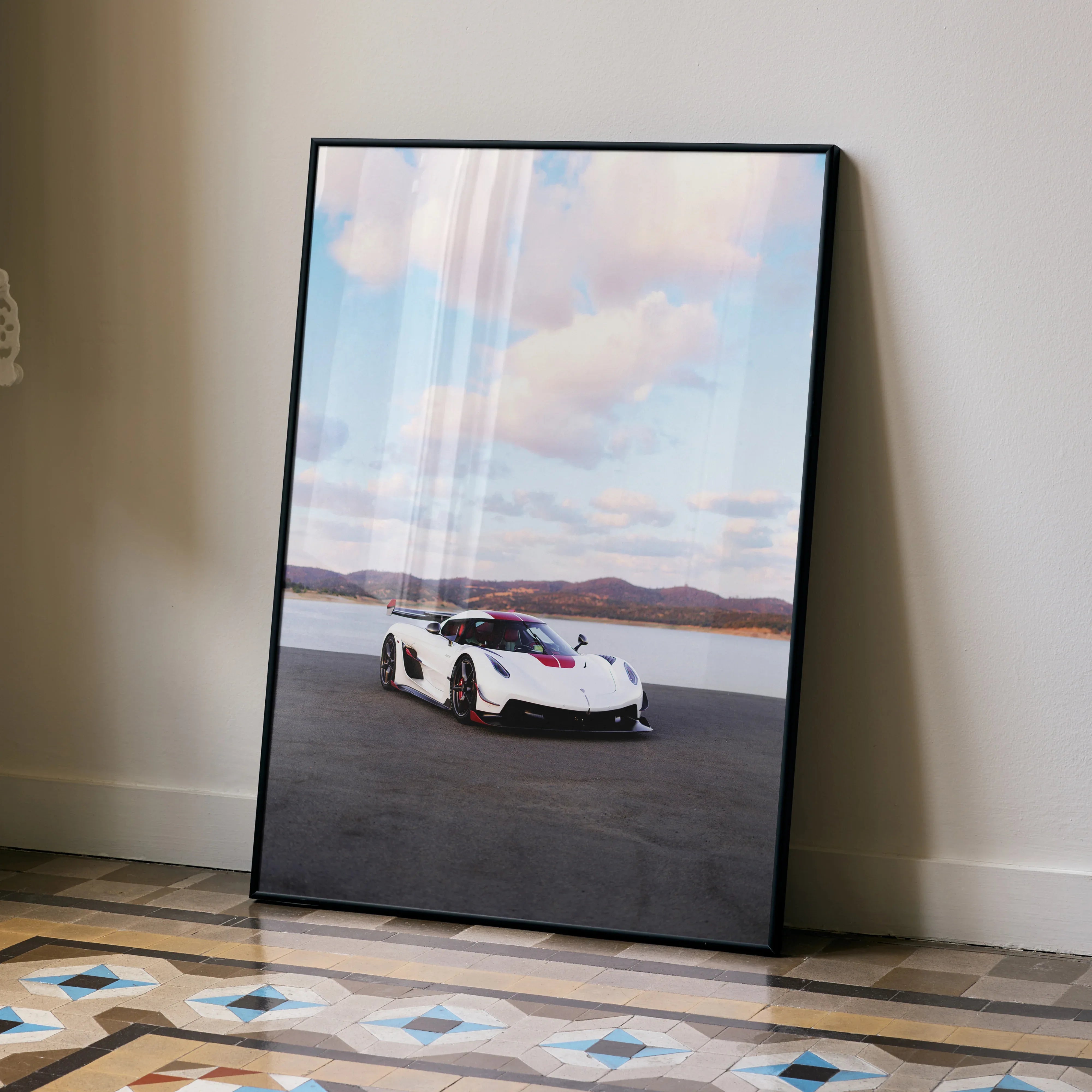 Koenigsegg Jesko supercar poster with sleek white design and open road background wall art.