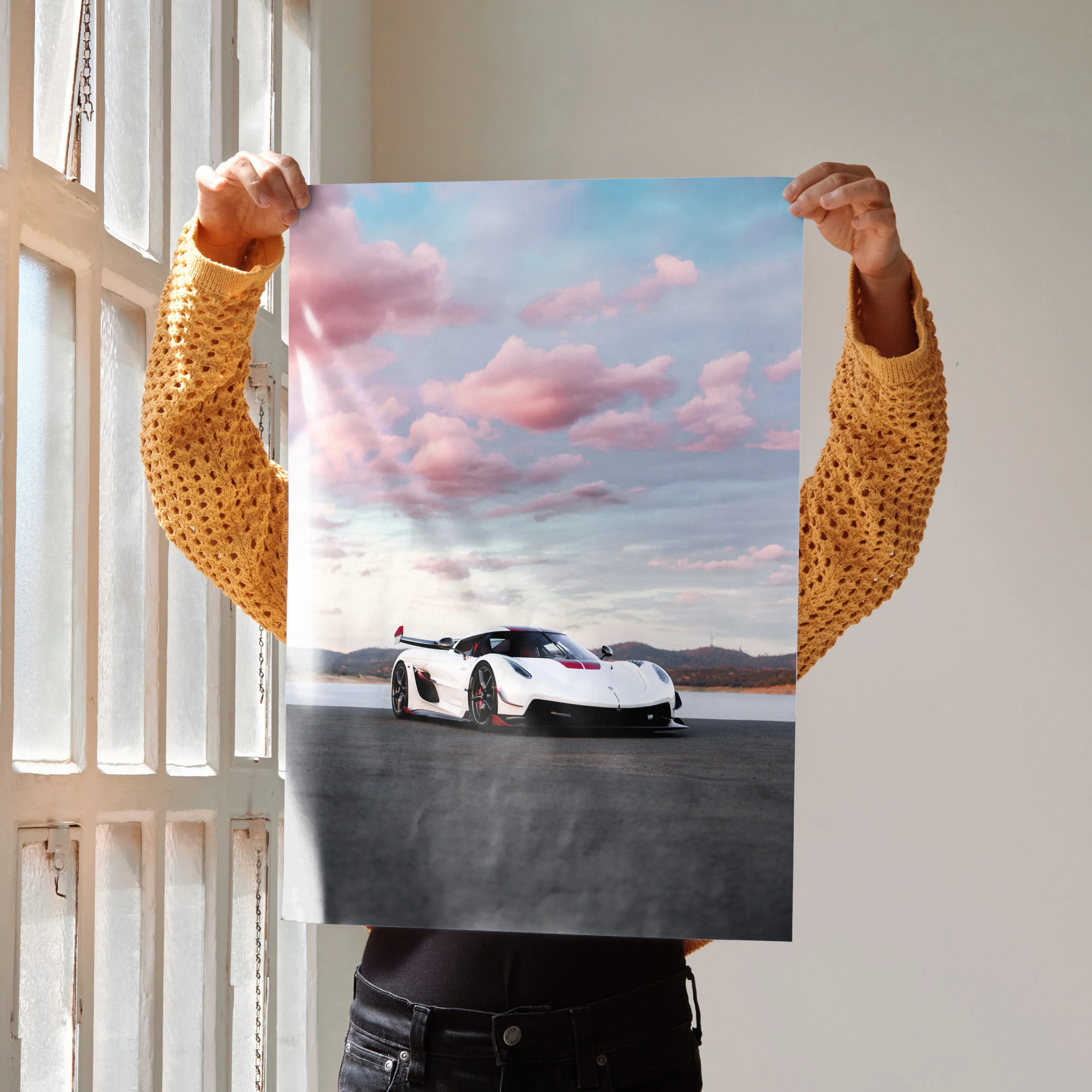 Koenigsegg Jesko supercar poster with pink cloud sky background wall art.