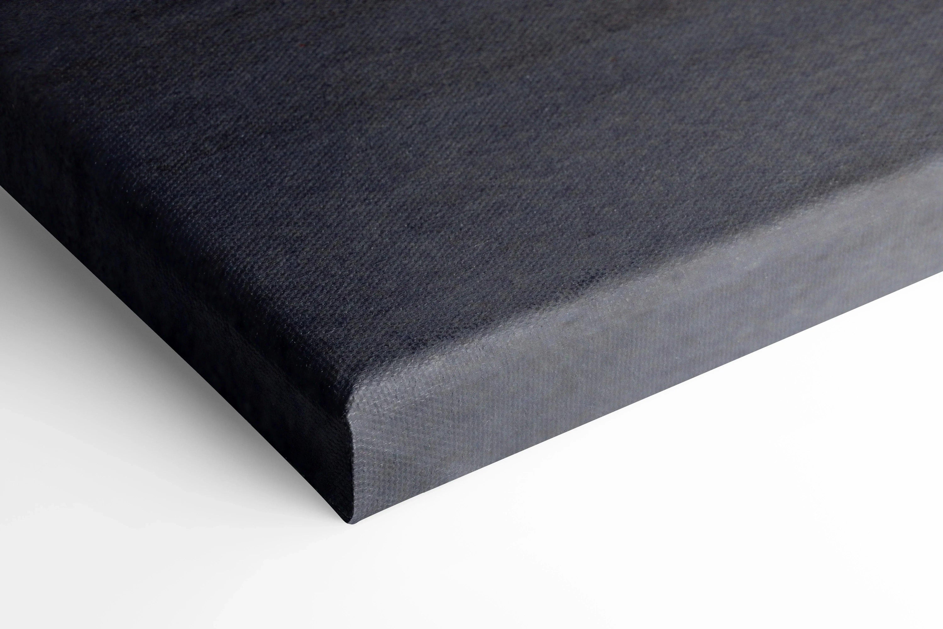 Close-up of black stretched canvas edge with smooth texture for wall art or canvas art display.