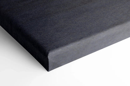 Close-up of black stretched canvas edge with smooth texture for wall art or canvas art display.