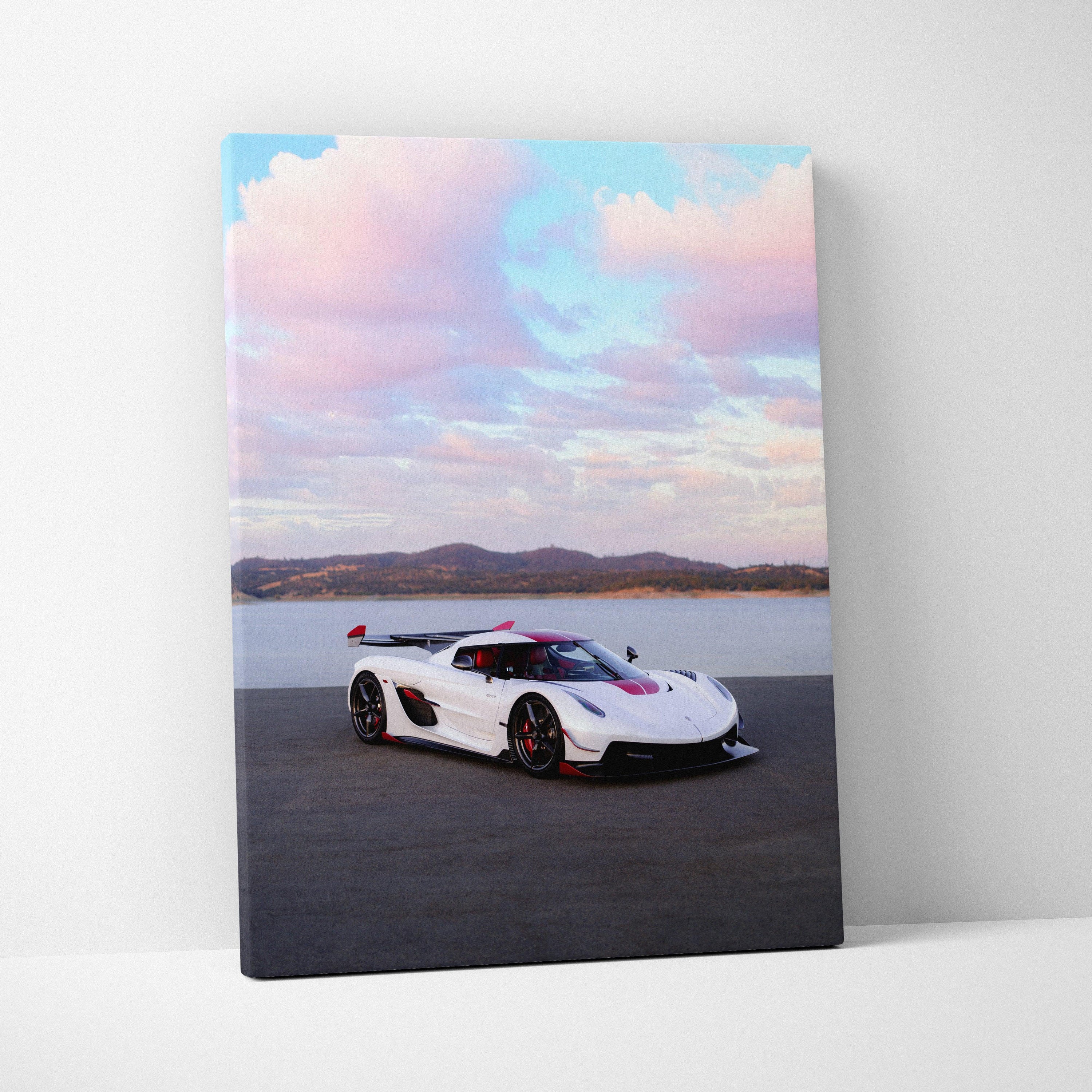 Koenigsegg Jesko sports car on asphalt with mountains and pastel sky vertical canvas wall art.
