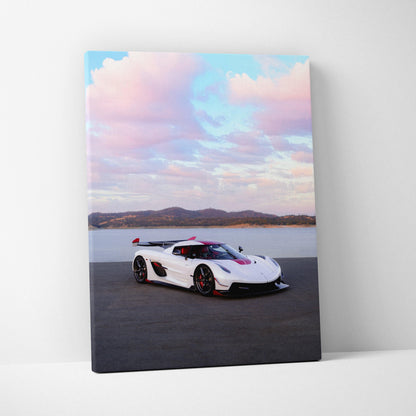 Koenigsegg Jesko sports car on asphalt with mountains and pastel sky vertical canvas wall art.