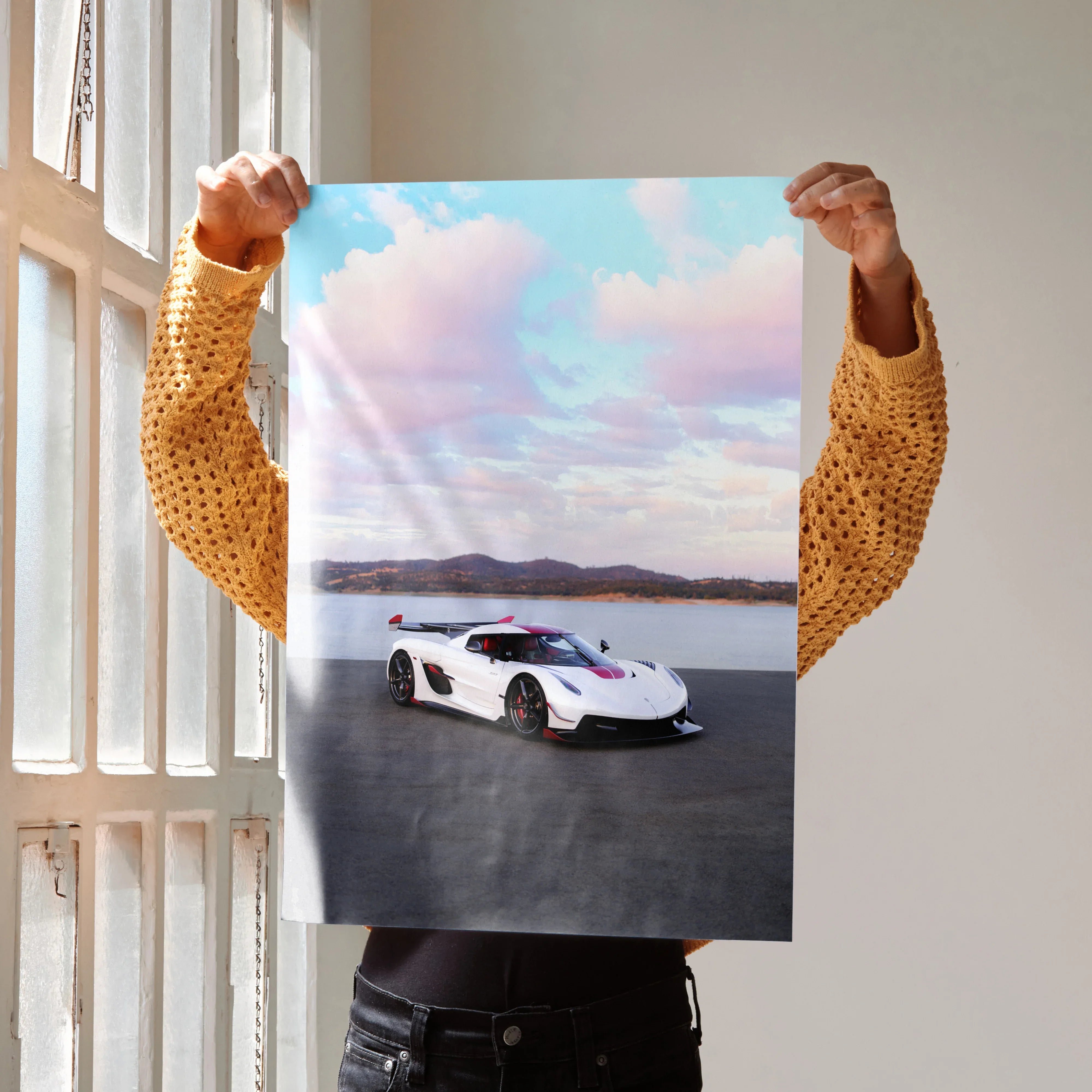 Koenigsegg Jesko white supercar on road with pink clouds poster wall art.