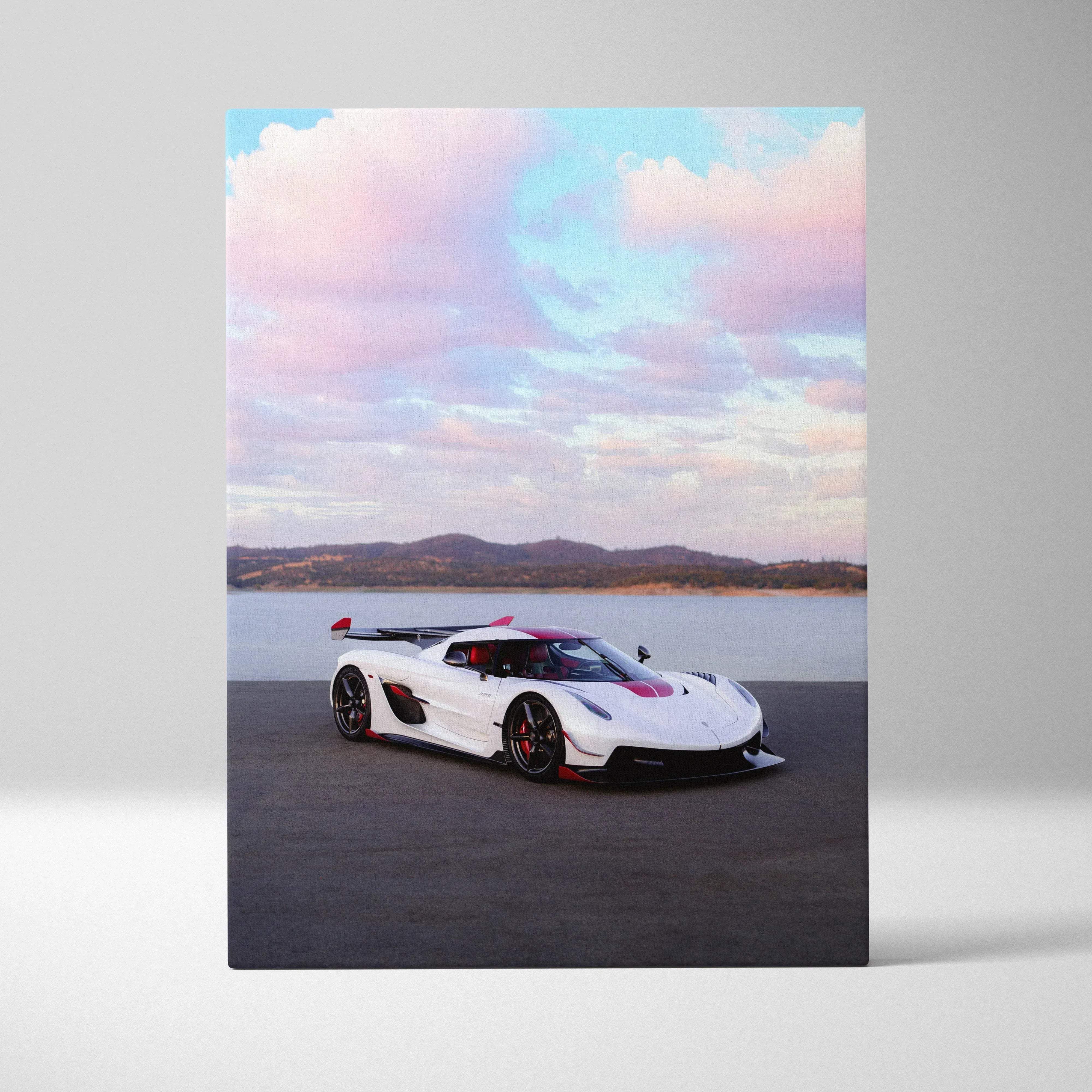 Canvas wall art featuring a high resolution vertical print of a white and red koenigsegg jesko hypercar by a lakeside sunset