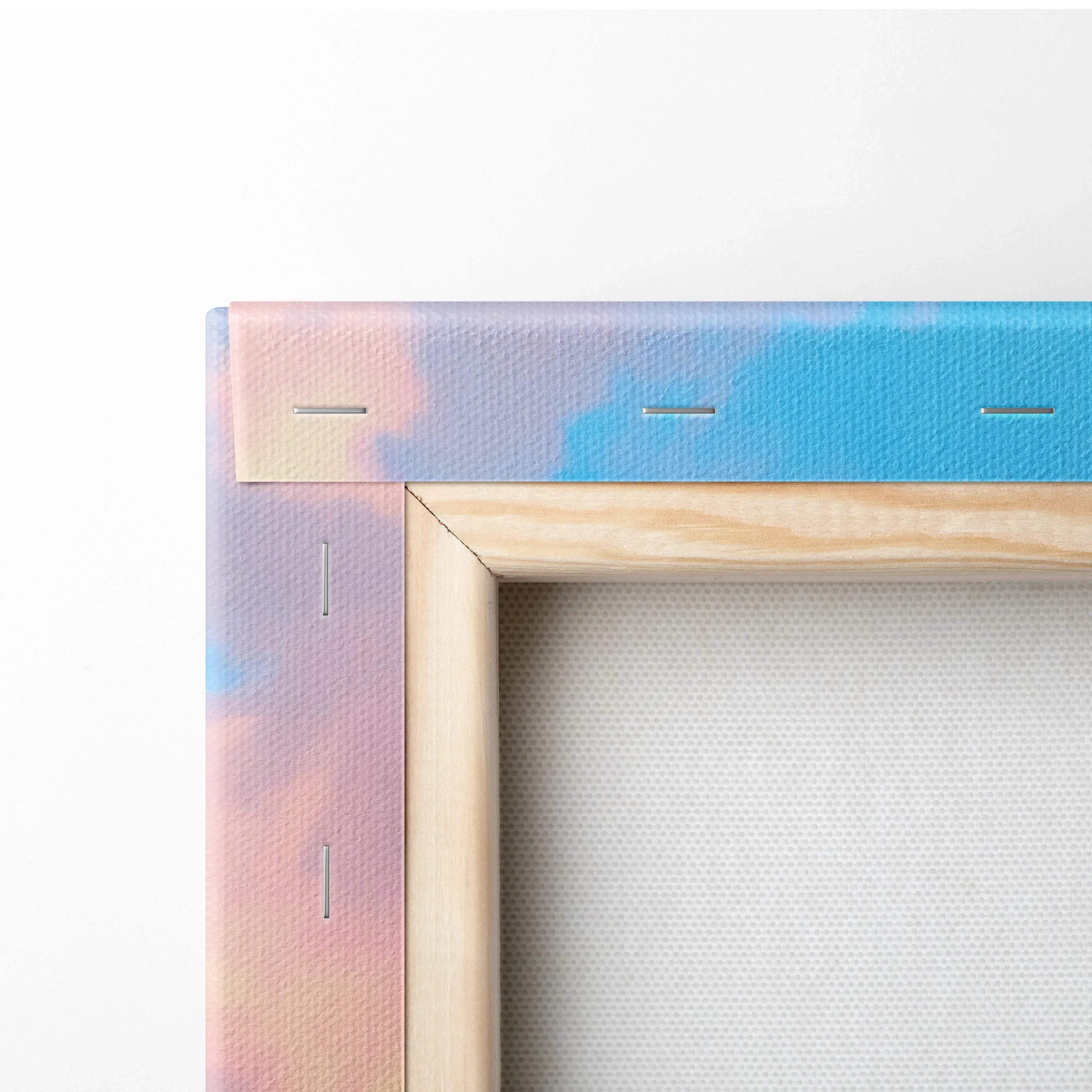 Close-up of wooden frame corner and stretched canvas with blue and pink hues, vertical canvas art wall decor.