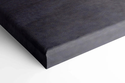 Close-up of black canvas wall art corner showing texture and wrapped edges for Koenigsegg Jesko car print.