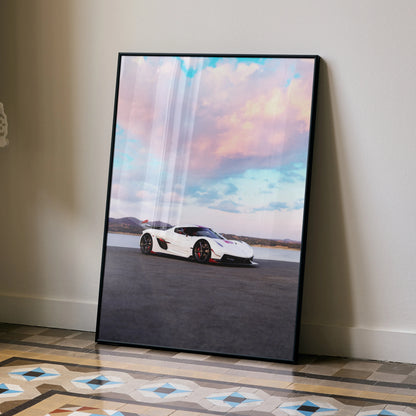 Koenigsegg Jesko car poster with white sports car and vibrant sunset sky wall art in black frame.