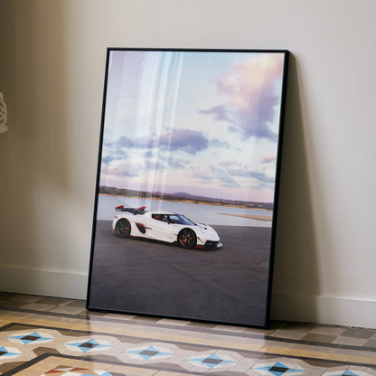 Koenigsegg Jesko white sports car poster leaning against wall with scenic sky background wall art.