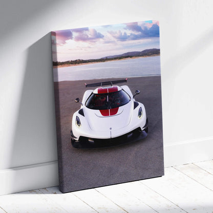 Vertical canvas art featuring a Koenigsegg Jesko sports car with red racing stripes by the water.