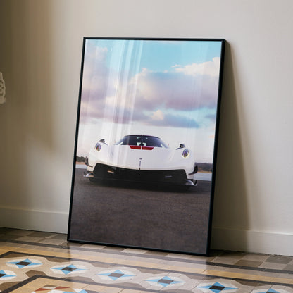 Koenigsegg Jesko white sports car poster with black frame leaning against wall wall art.