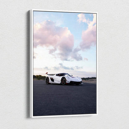 Vertical canvas art featuring a white Koenigsegg Jesko sports car under a blue sky with clouds, high-resolution wall art.