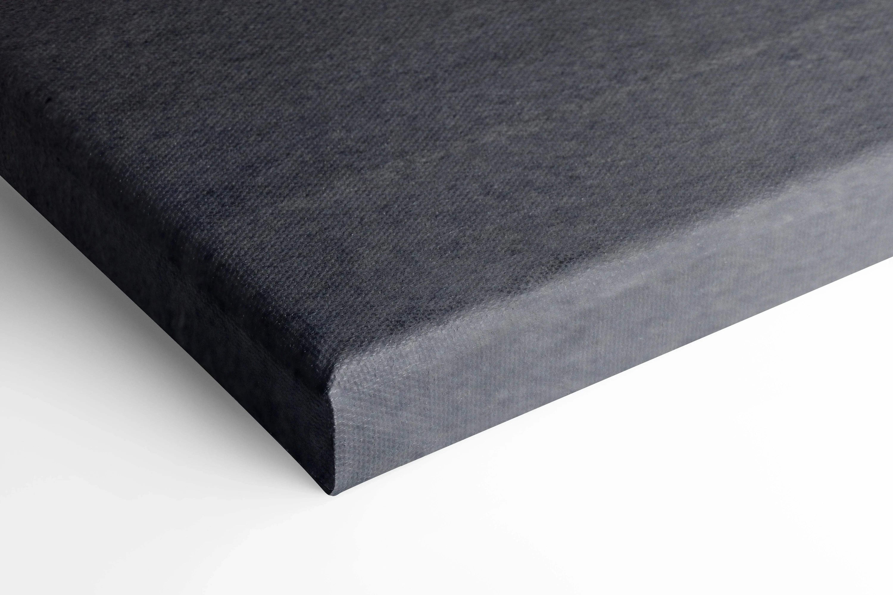Close-up of black fabric wrapped around canvas edge for wall art canvas print.