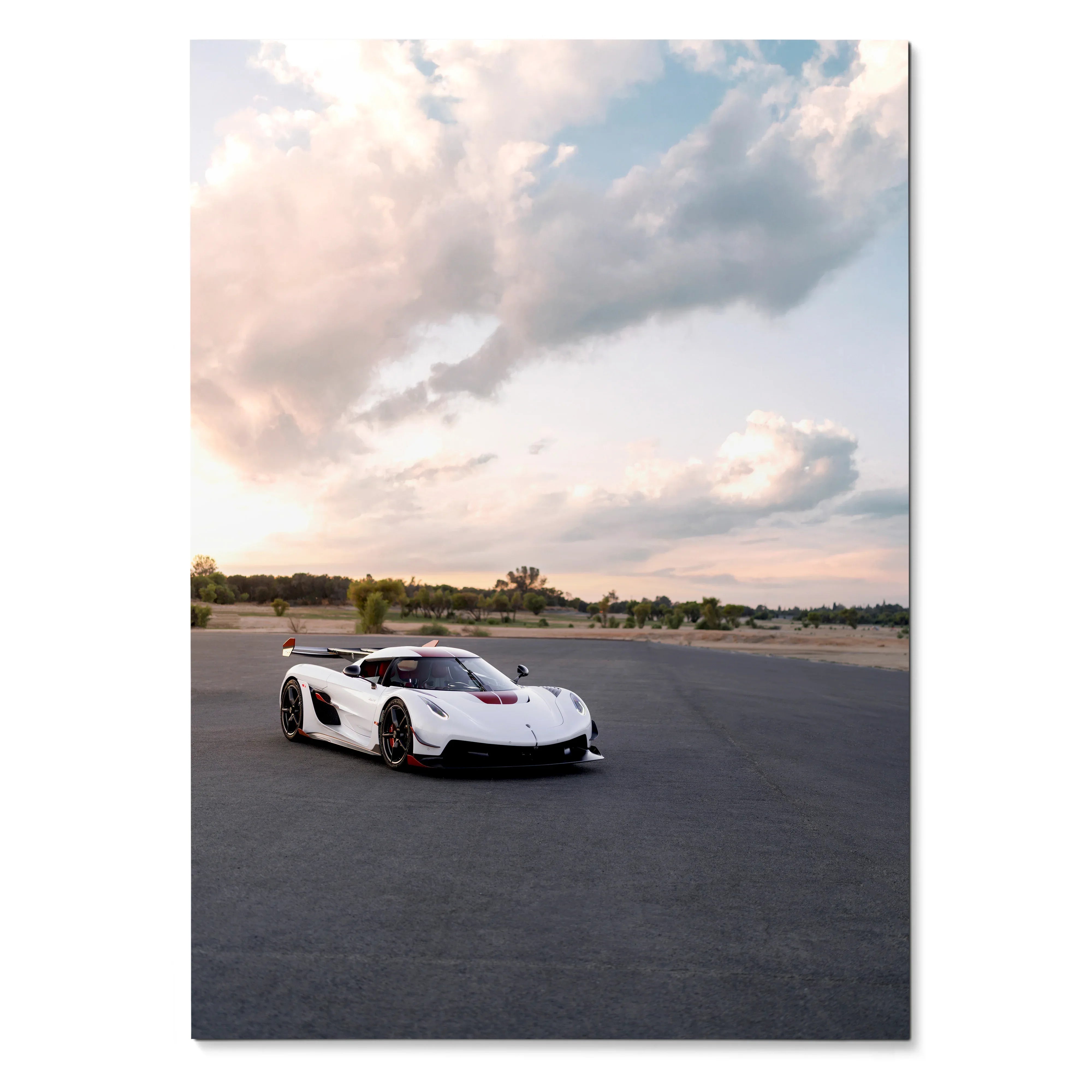 Koenigsegg Jesko supercar parked on asphalt under expansive cloudy sky poster wall art.