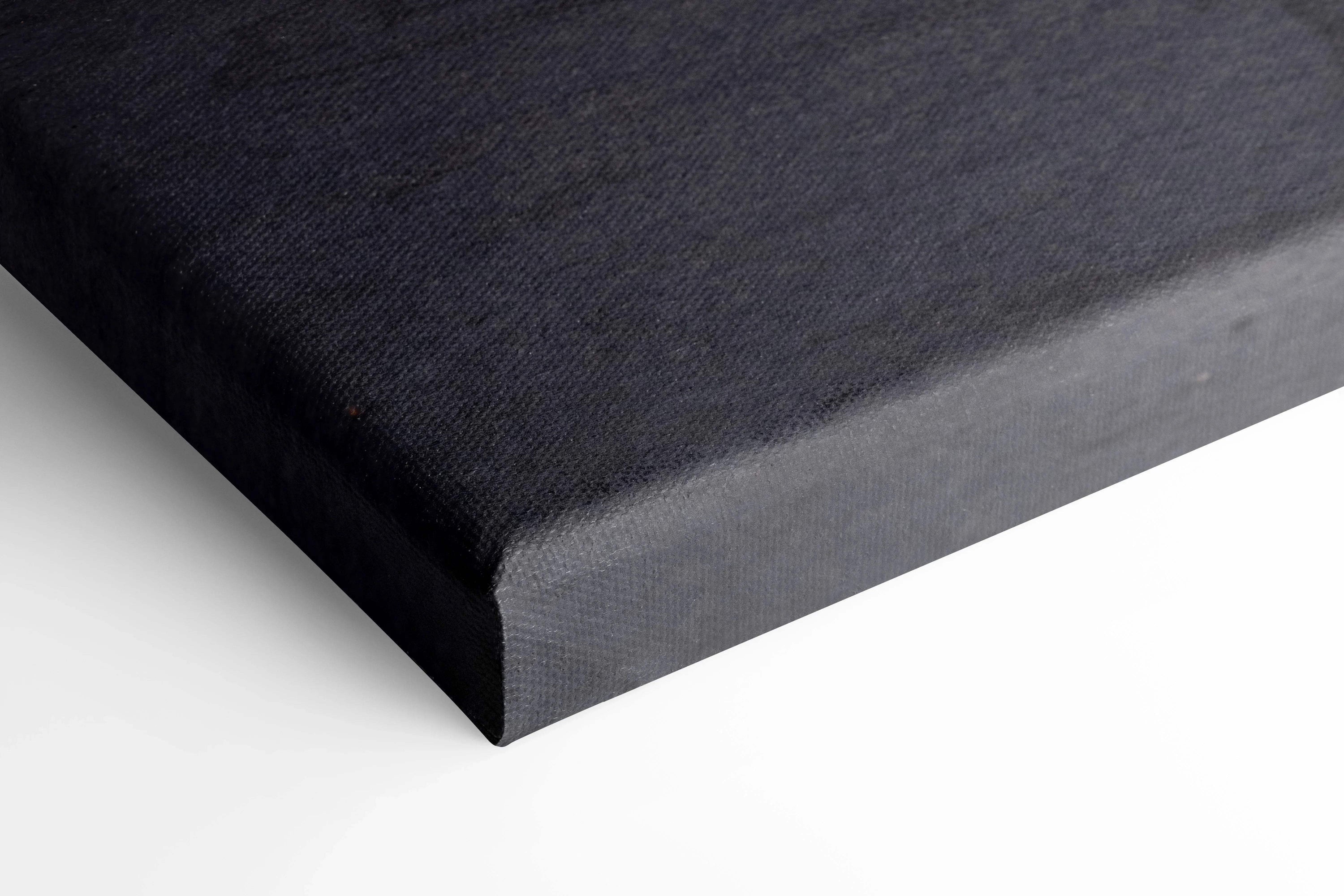 Black canvas wall art corner with smooth texture and gallery-wrapped edges in vertical format.