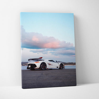 Vertical canvas wall art of a white Koenigsegg Jesko supercar under a pastel sky.