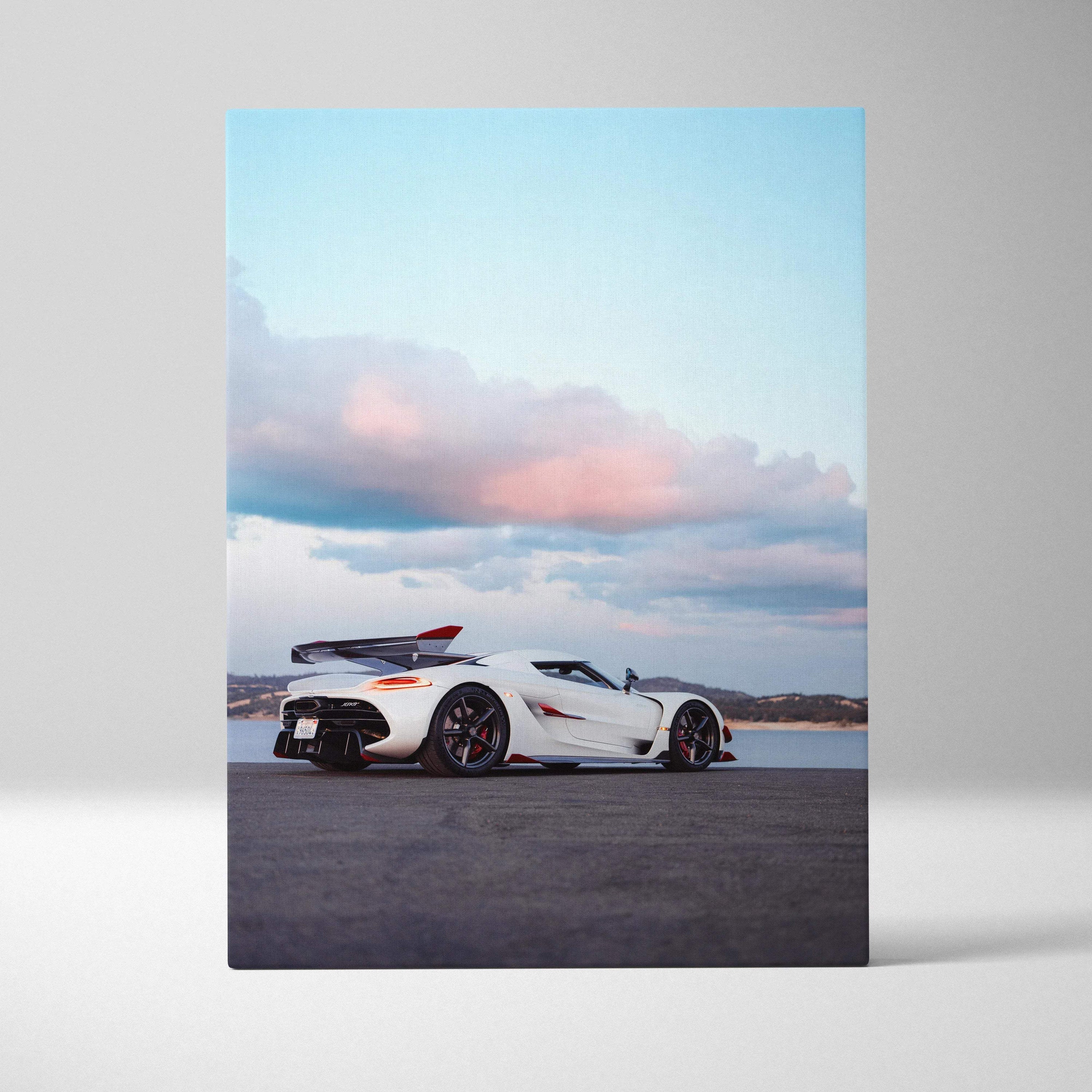 Koenigsegg Jesko white sports car on road with blue sky wall art canvas print.
