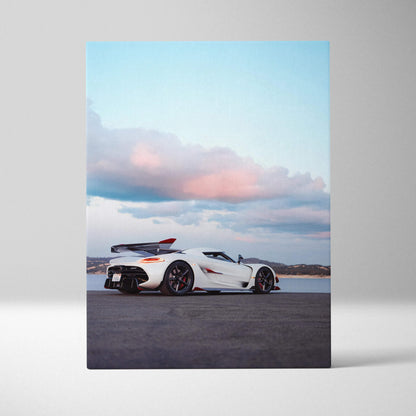 Koenigsegg Jesko white sports car on road with blue sky wall art canvas print.