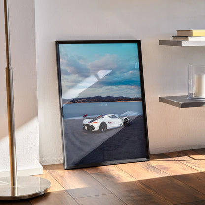Koenigsegg Jesko poster showcasing white sports car against blue sky, sleek modern wall art.