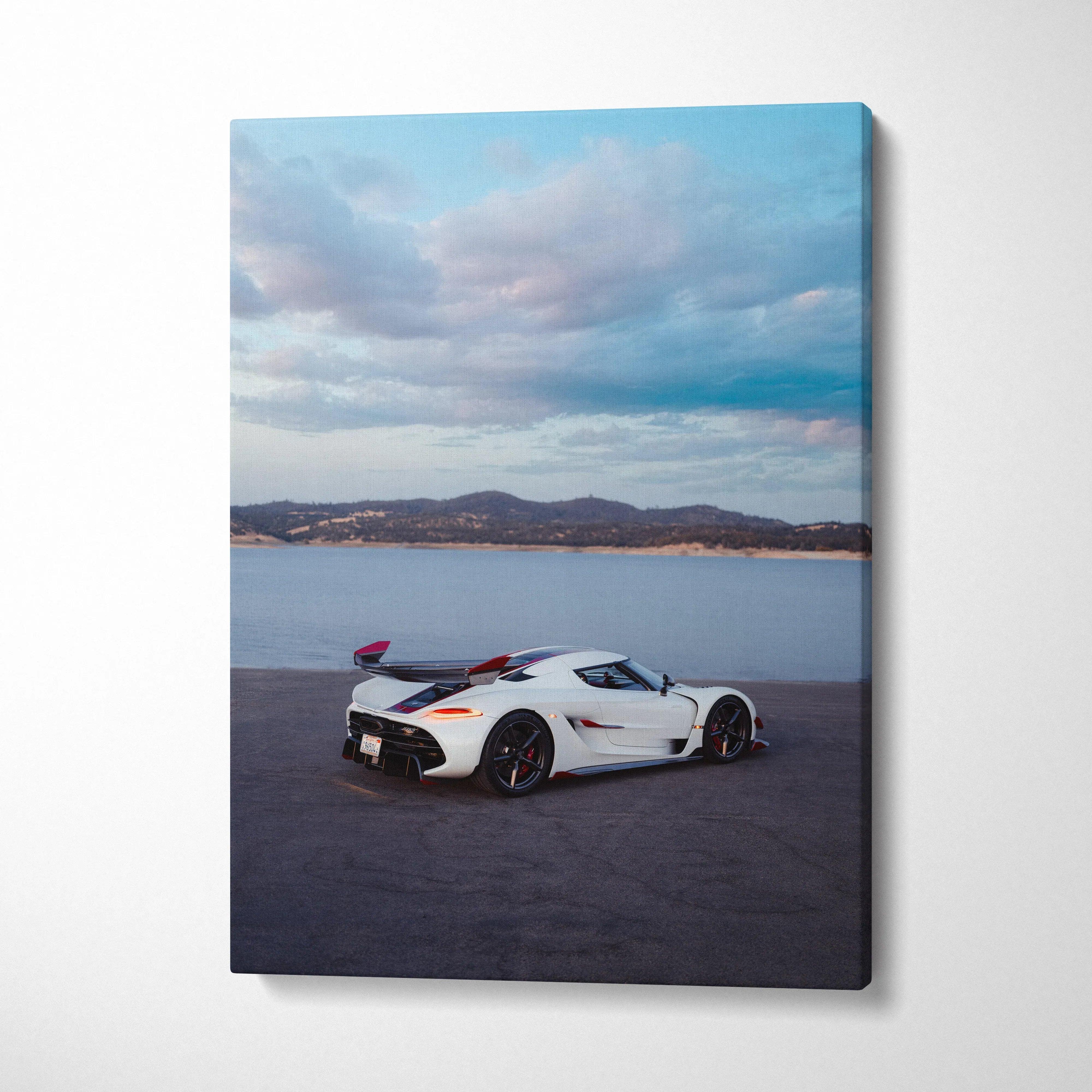 Koenigsegg Jesko sports car parked near water under cloudy sky on vertical canvas wall art.