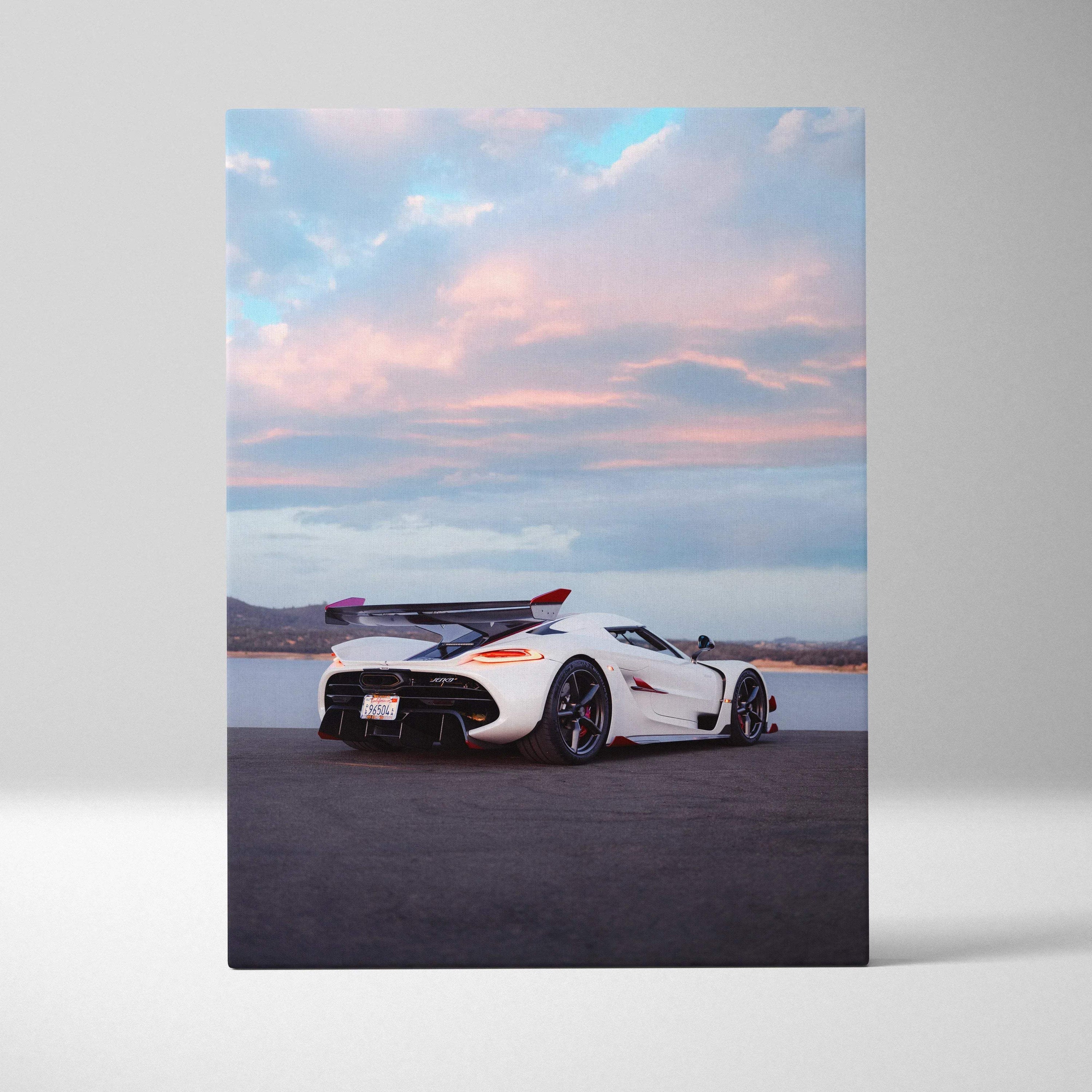 Koenigsegg Jesko white sports car on asphalt under pink and blue sky vertical canvas wall art.