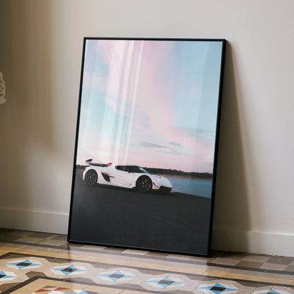 Koenigsegg Jesko white sports car on road at sunset poster wall art in black frame.